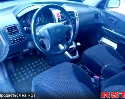 Синій Хендай Туксон, об'ємом двигуна 2 л та пробігом 153 тис. км за 8200 $, фото 7 на Automoto.ua