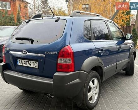 Синий Хендай Туксон, объемом двигателя 1.98 л и пробегом 163 тыс. км за 7990 $, фото 10 на Automoto.ua
