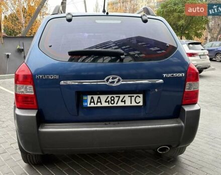 Синий Хендай Туксон, объемом двигателя 1.98 л и пробегом 163 тыс. км за 7990 $, фото 11 на Automoto.ua