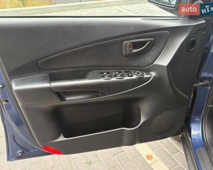 Синий Хендай Туксон, объемом двигателя 1.98 л и пробегом 163 тыс. км за 7990 $, фото 29 на Automoto.ua