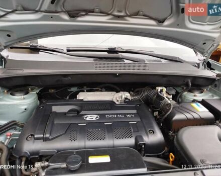 Синий Хендай Туксон, объемом двигателя 2 л и пробегом 213 тыс. км за 8900 $, фото 85 на Automoto.ua