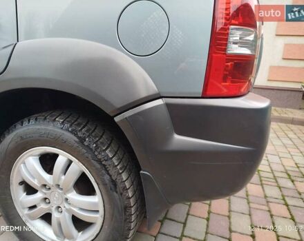 Синий Хендай Туксон, объемом двигателя 2 л и пробегом 213 тыс. км за 8900 $, фото 23 на Automoto.ua