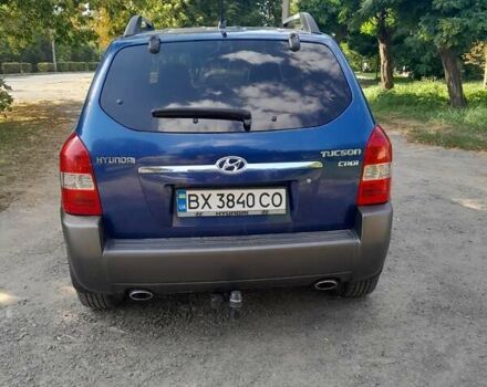Синій Хендай Туксон, об'ємом двигуна 1.99 л та пробігом 175 тис. км за 7600 $, фото 5 на Automoto.ua