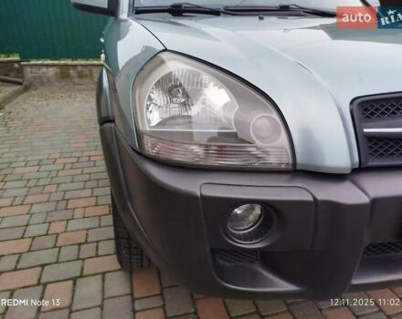 Синий Хендай Туксон, объемом двигателя 2 л и пробегом 213 тыс. км за 8900 $, фото 38 на Automoto.ua