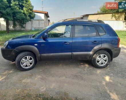 Синій Хендай Туксон, об'ємом двигуна 1.99 л та пробігом 175 тис. км за 7600 $, фото 1 на Automoto.ua