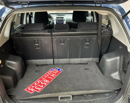 Синий Хендай Туксон, объемом двигателя 1.98 л и пробегом 230 тыс. км за 6555 $, фото 14 на Automoto.ua