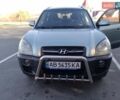 Синий Хендай Туксон, объемом двигателя 1.98 л и пробегом 215 тыс. км за 8600 $, фото 1 на Automoto.ua
