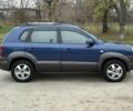 Синий Хендай Туксон, объемом двигателя 2 л и пробегом 279 тыс. км за 6280 $, фото 3 на Automoto.ua