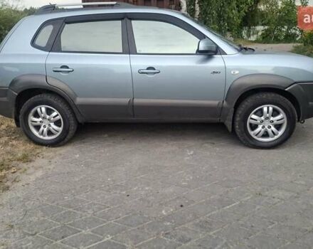 Синий Хендай Туксон, объемом двигателя 1.98 л и пробегом 310 тыс. км за 8200 $, фото 1 на Automoto.ua