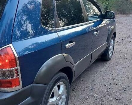 Синий Хендай Туксон, объемом двигателя 2 л и пробегом 283 тыс. км за 8200 $, фото 20 на Automoto.ua
