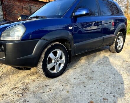 Синий Хендай Туксон, объемом двигателя 2 л и пробегом 208 тыс. км за 6700 $, фото 1 на Automoto.ua