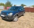 Синий Хендай Туксон, объемом двигателя 2 л и пробегом 240 тыс. км за 7700 $, фото 1 на Automoto.ua