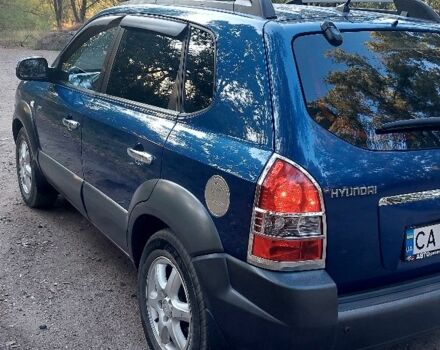 Синій Хендай Туксон, об'ємом двигуна 2 л та пробігом 283 тис. км за 8200 $, фото 19 на Automoto.ua