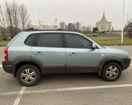 Синий Хендай Туксон, объемом двигателя 2 л и пробегом 179 тыс. км за 6500 $, фото 2 на Automoto.ua