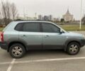 Синий Хендай Туксон, объемом двигателя 2 л и пробегом 179 тыс. км за 6500 $, фото 2 на Automoto.ua