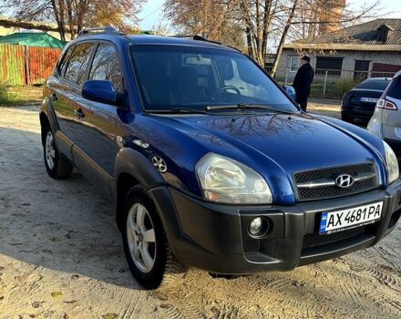 Синий Хендай Туксон, объемом двигателя 2 л и пробегом 208 тыс. км за 6700 $, фото 4 на Automoto.ua