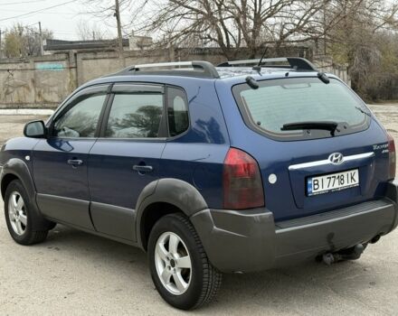 Синий Хендай Туксон, объемом двигателя 2 л и пробегом 279 тыс. км за 6280 $, фото 7 на Automoto.ua