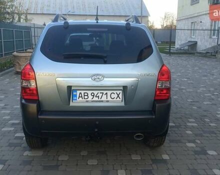 Синий Хендай Туксон, объемом двигателя 1.98 л и пробегом 183 тыс. км за 6700 $, фото 3 на Automoto.ua