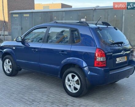 Синий Хендай Туксон, объемом двигателя 1.98 л и пробегом 178 тыс. км за 8700 $, фото 14 на Automoto.ua