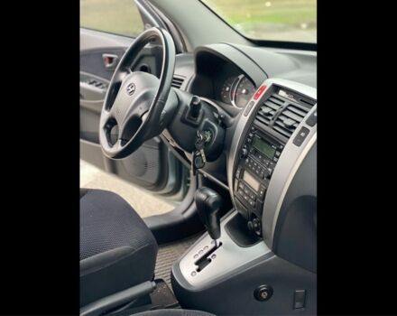 Синий Хендай Туксон, объемом двигателя 2 л и пробегом 179 тыс. км за 6500 $, фото 13 на Automoto.ua