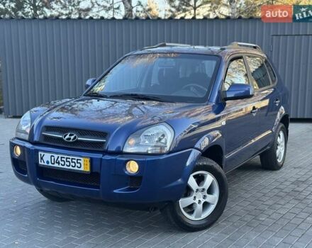 Синий Хендай Туксон, объемом двигателя 1.98 л и пробегом 178 тыс. км за 8700 $, фото 6 на Automoto.ua