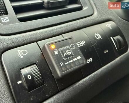 Синий Хендай Туксон, объемом двигателя 2 л и пробегом 270 тыс. км за 6250 $, фото 19 на Automoto.ua