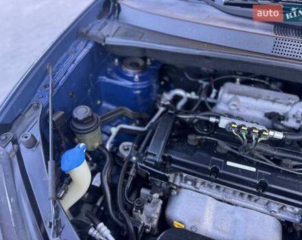 Синий Хендай Туксон, объемом двигателя 1.98 л и пробегом 178 тыс. км за 8700 $, фото 35 на Automoto.ua