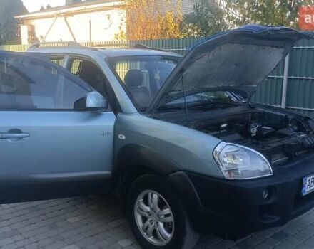 Синий Хендай Туксон, объемом двигателя 1.98 л и пробегом 183 тыс. км за 6700 $, фото 19 на Automoto.ua