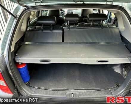 Синий Хендай Туксон, объемом двигателя 2 л и пробегом 233 тыс. км за 8300 $, фото 11 на Automoto.ua