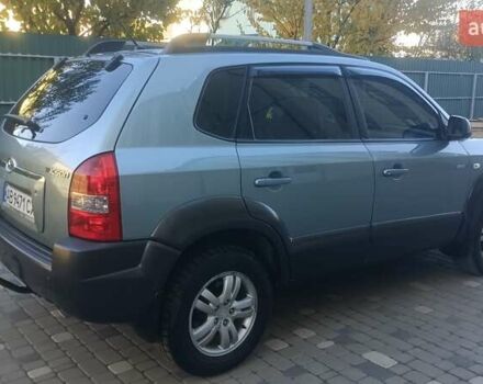 Синий Хендай Туксон, объемом двигателя 1.98 л и пробегом 183 тыс. км за 6700 $, фото 2 на Automoto.ua