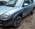 Синий Хендай Туксон, объемом двигателя 2 л и пробегом 197 тыс. км за 8300 $, фото 1 на Automoto.ua