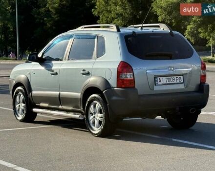 Синий Хендай Туксон, объемом двигателя 1.98 л и пробегом 219 тыс. км за 8500 $, фото 2 на Automoto.ua