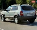 Синий Хендай Туксон, объемом двигателя 1.98 л и пробегом 219 тыс. км за 8500 $, фото 2 на Automoto.ua