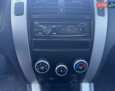 Синий Хендай Туксон, объемом двигателя 1.98 л и пробегом 178 тыс. км за 8700 $, фото 24 на Automoto.ua