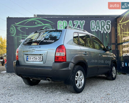 Синий Хендай Туксон, объемом двигателя 2 л и пробегом 317 тыс. км за 9600 $, фото 5 на Automoto.ua