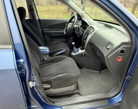 Синий Хендай Туксон, объемом двигателя 2 л и пробегом 279 тыс. км за 6280 $, фото 12 на Automoto.ua