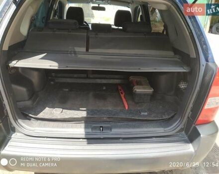 Синий Хендай Туксон, объемом двигателя 2 л и пробегом 200 тыс. км за 7600 $, фото 12 на Automoto.ua