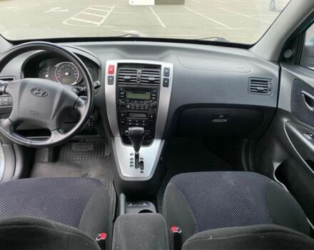 Синий Хендай Туксон, объемом двигателя 2 л и пробегом 179 тыс. км за 6500 $, фото 12 на Automoto.ua