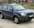 Синий Хендай Туксон, объемом двигателя 2 л и пробегом 270 тыс. км за 6250 $, фото 1 на Automoto.ua