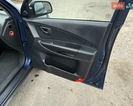 Синий Хендай Туксон, объемом двигателя 2 л и пробегом 270 тыс. км за 6250 $, фото 10 на Automoto.ua