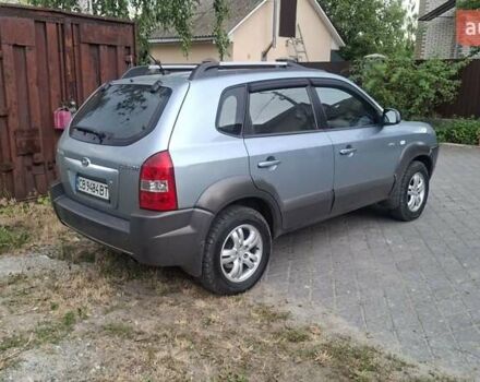 Синий Хендай Туксон, объемом двигателя 1.98 л и пробегом 310 тыс. км за 8200 $, фото 3 на Automoto.ua