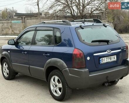 Синий Хендай Туксон, объемом двигателя 2 л и пробегом 270 тыс. км за 6250 $, фото 5 на Automoto.ua