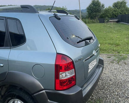 Синий Хендай Туксон, объемом двигателя 1.98 л и пробегом 260 тыс. км за 8000 $, фото 3 на Automoto.ua