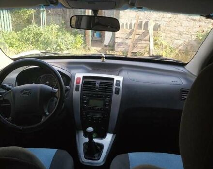 Синий Хендай Туксон, объемом двигателя 2 л и пробегом 200 тыс. км за 7600 $, фото 11 на Automoto.ua