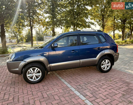 Синий Хендай Туксон, объемом двигателя 2 л и пробегом 168 тыс. км за 7500 $, фото 6 на Automoto.ua