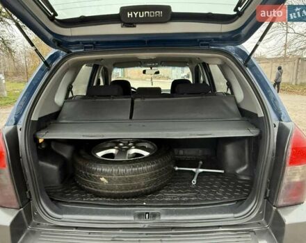Синий Хендай Туксон, объемом двигателя 2 л и пробегом 270 тыс. км за 6250 $, фото 21 на Automoto.ua