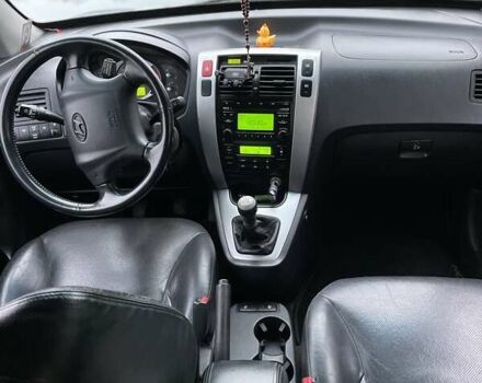 Синий Хендай Туксон, объемом двигателя 1.98 л и пробегом 168 тыс. км за 8500 $, фото 7 на Automoto.ua