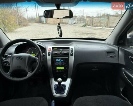 Синий Хендай Туксон, объемом двигателя 2 л и пробегом 270 тыс. км за 6250 $, фото 16 на Automoto.ua