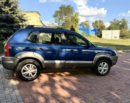 Синий Хендай Туксон, объемом двигателя 2 л и пробегом 168 тыс. км за 7500 $, фото 2 на Automoto.ua