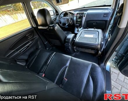 Синий Хендай Туксон, объемом двигателя 2 л и пробегом 233 тыс. км за 8300 $, фото 6 на Automoto.ua